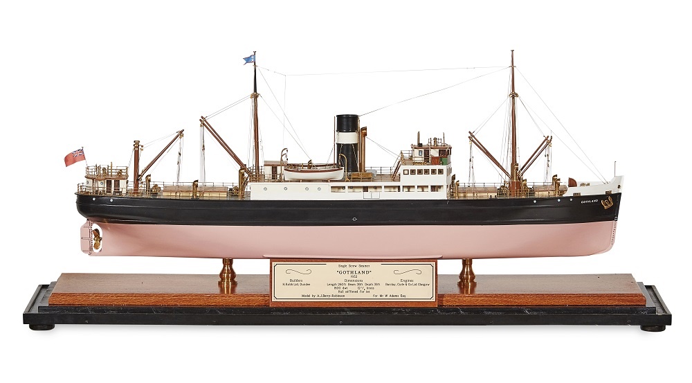 LOT 197 | A MODEL OF A SINGLE SCREW STEAMER | GOTHLAND 1932 | built by A. J. Berry-Robinson for Mr W. Adams, the ship supplied to Builders H. Robb Ltd., Dundee, contained in a brass framed display case with engraved plaque with details, the hull stiffened for use in icy waters | 79cm model length | £1,500 - £2,000 + fees